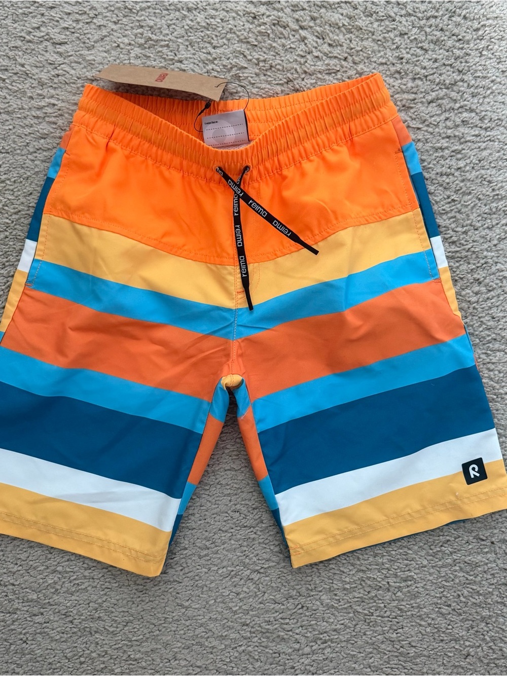 Reima new with tags Boys Orange & Blue Striped Swim Trunks size 9 youth